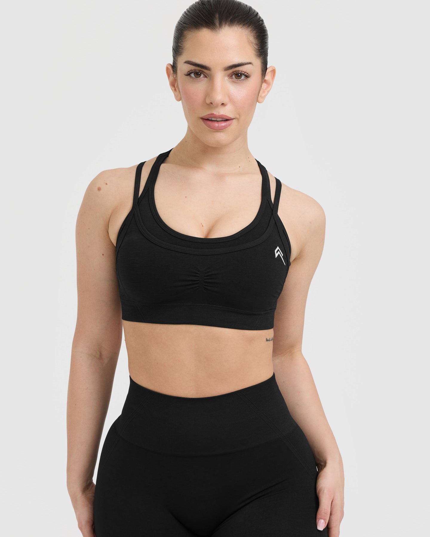 EffortlessLift Seamless Layered Sports Bra with White Logo | Black - Image 4