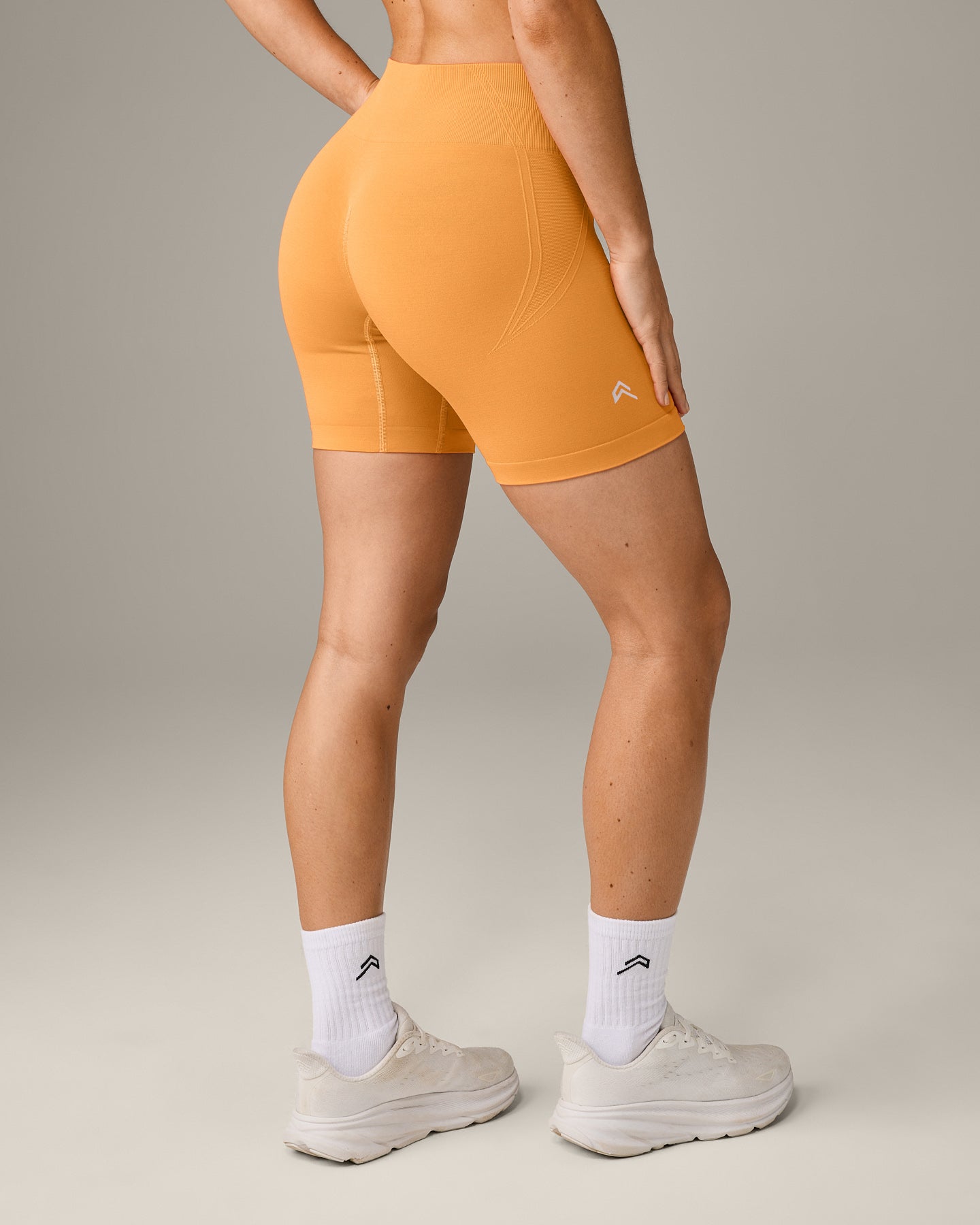 EffortlessLift Seamless Mid Rise Shorts with Grey Logo | Powdered Orange