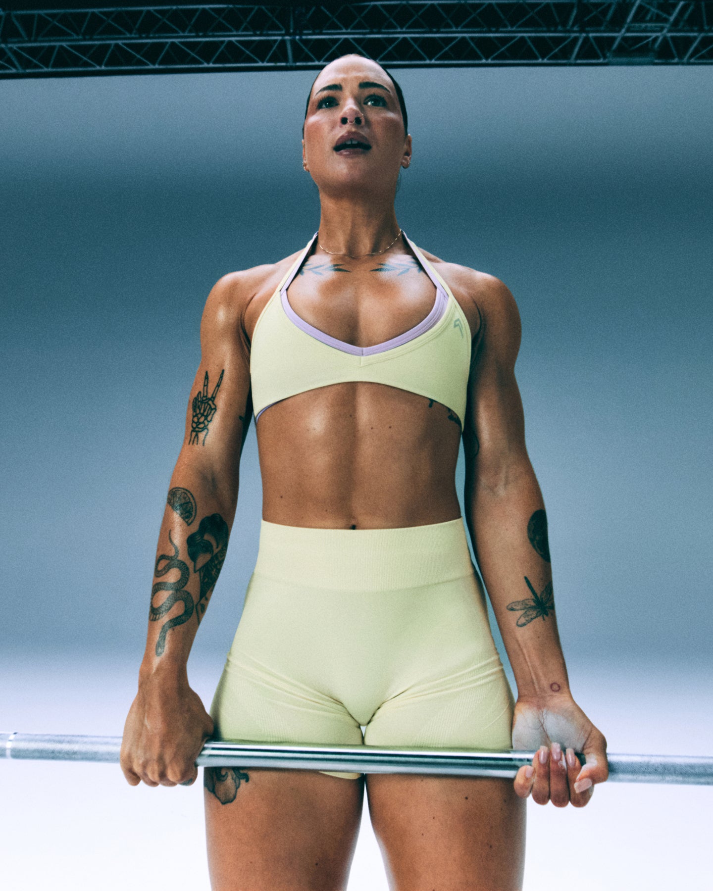 EnhanceLift Seamless Minimal Halter Neck Bralette with Grey Logo | Pastel Yellow - Image 2